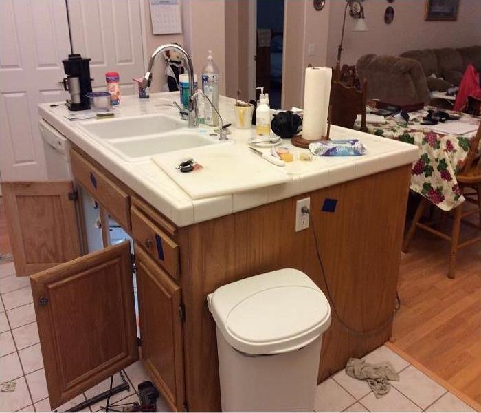 kitchen island sink has broken pipe under sink