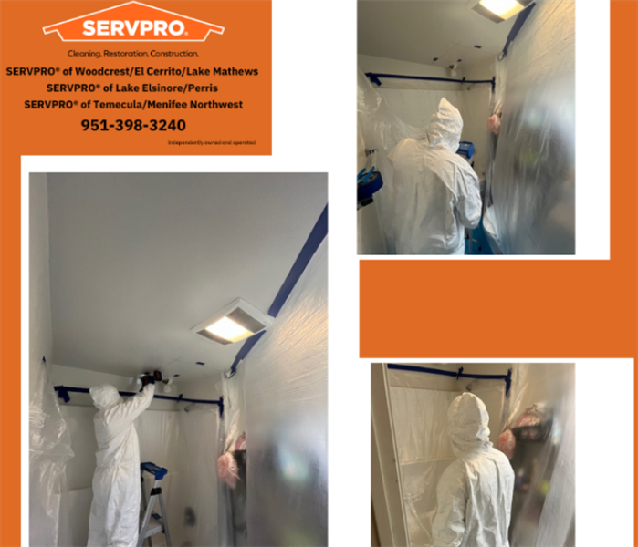 Our SERVPRO technician is expertly clearing out the bathroom ceiling, removing damaged insulation and drywall.